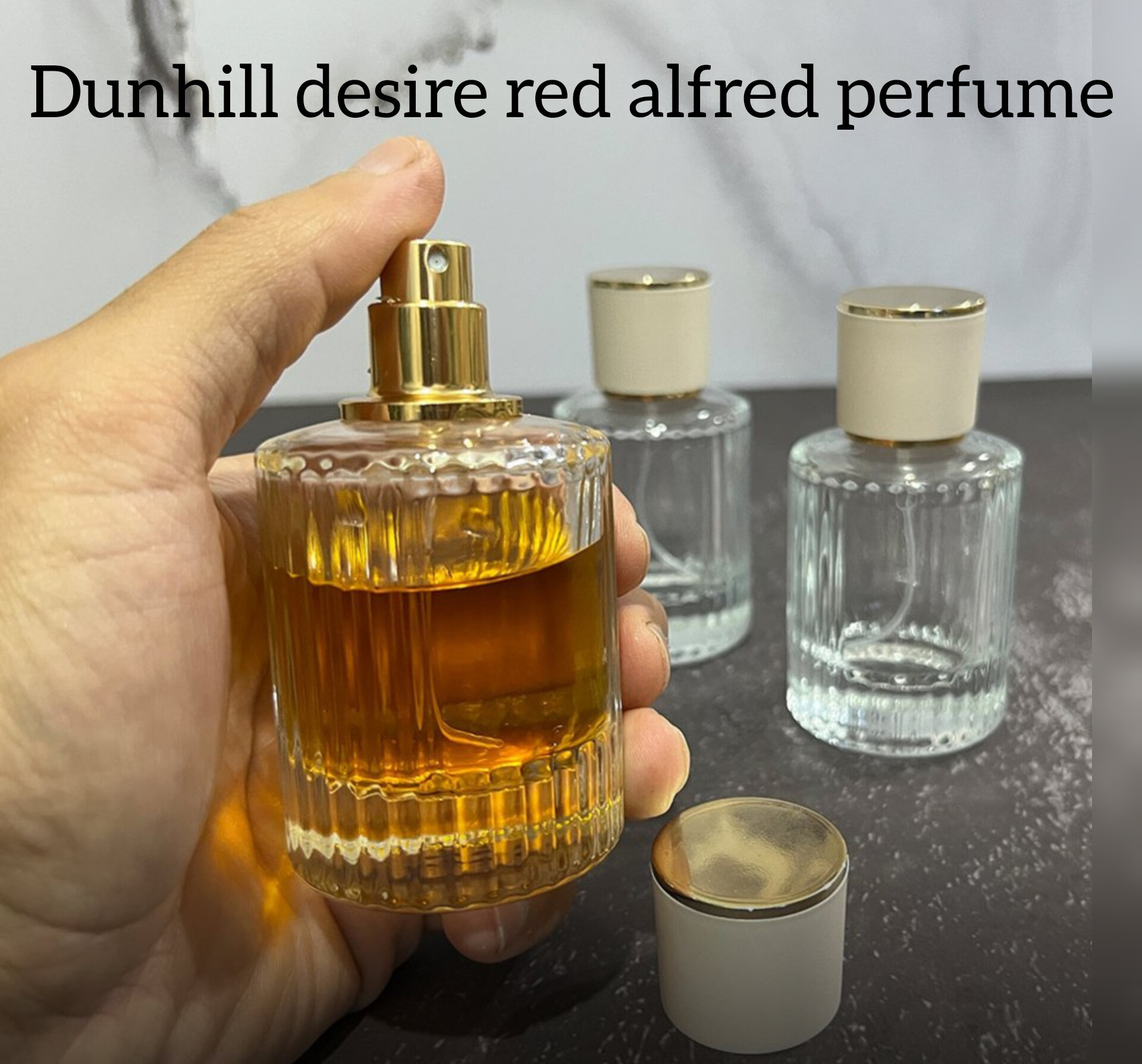 اسانس گرمی عطر مردانه دانهیل دیزایر رد _ کد ۷۵۶